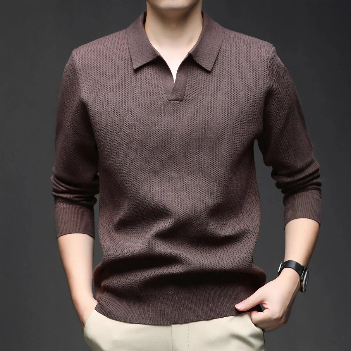 Men's loose-fitting casual pullover sweater in autumn colours on a hanger