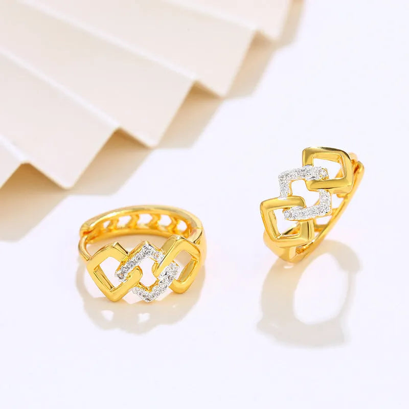 Geometric hollow-out earrings with gold electroplating and ear clip fastening
