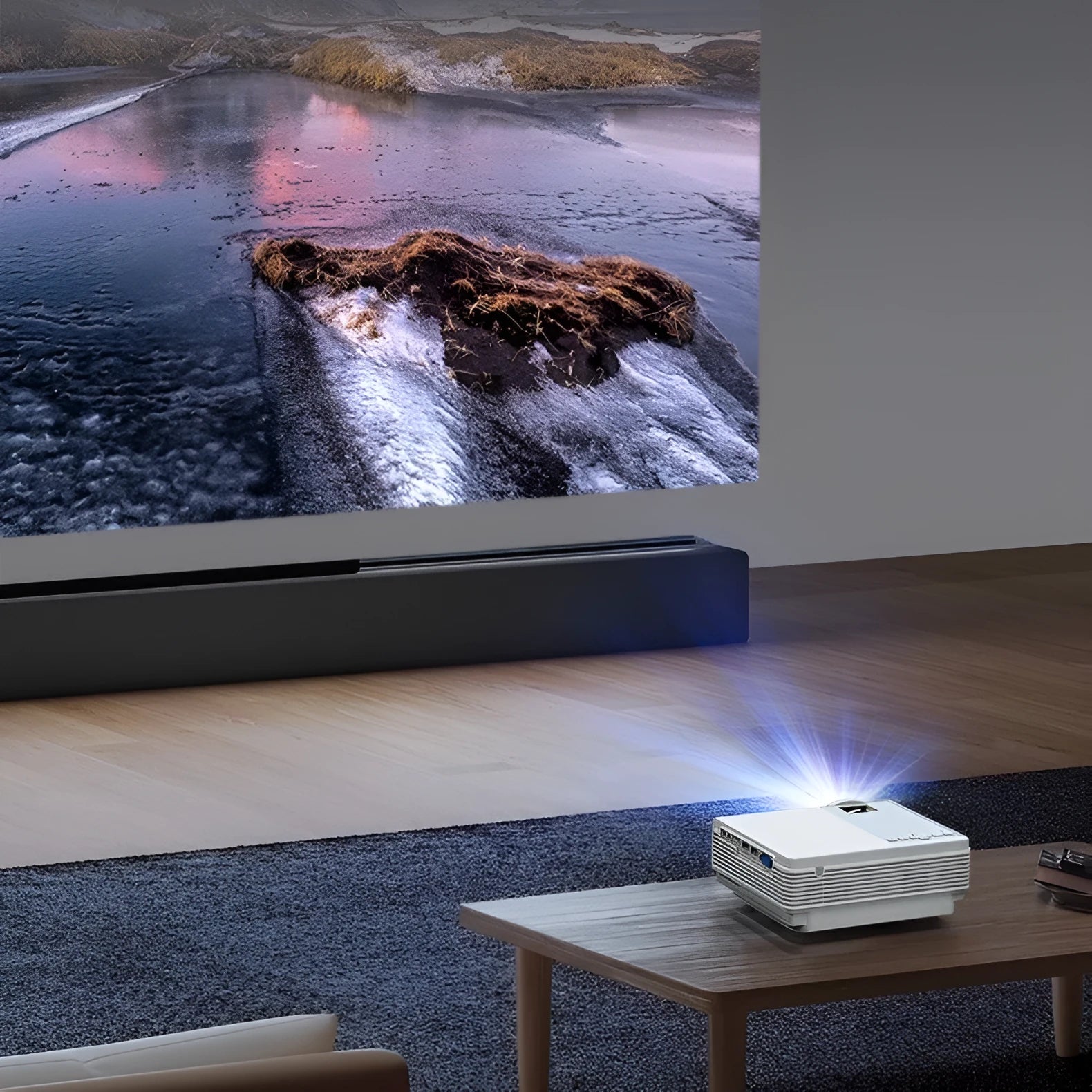 Portable HD projector in white with 1080p resolution and compact 185x199x75mm design