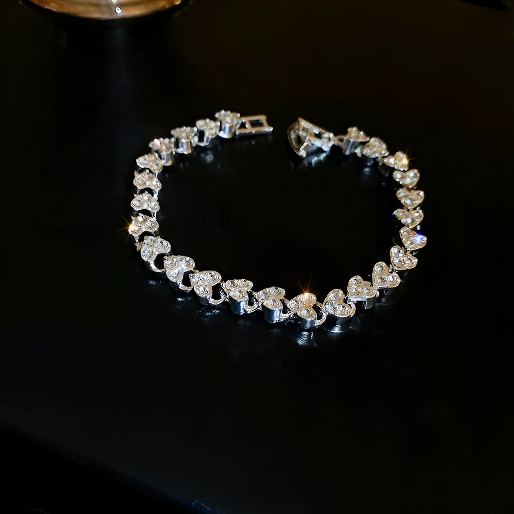 Silver heart-shaped metal bracelet for women with inlaid zircon