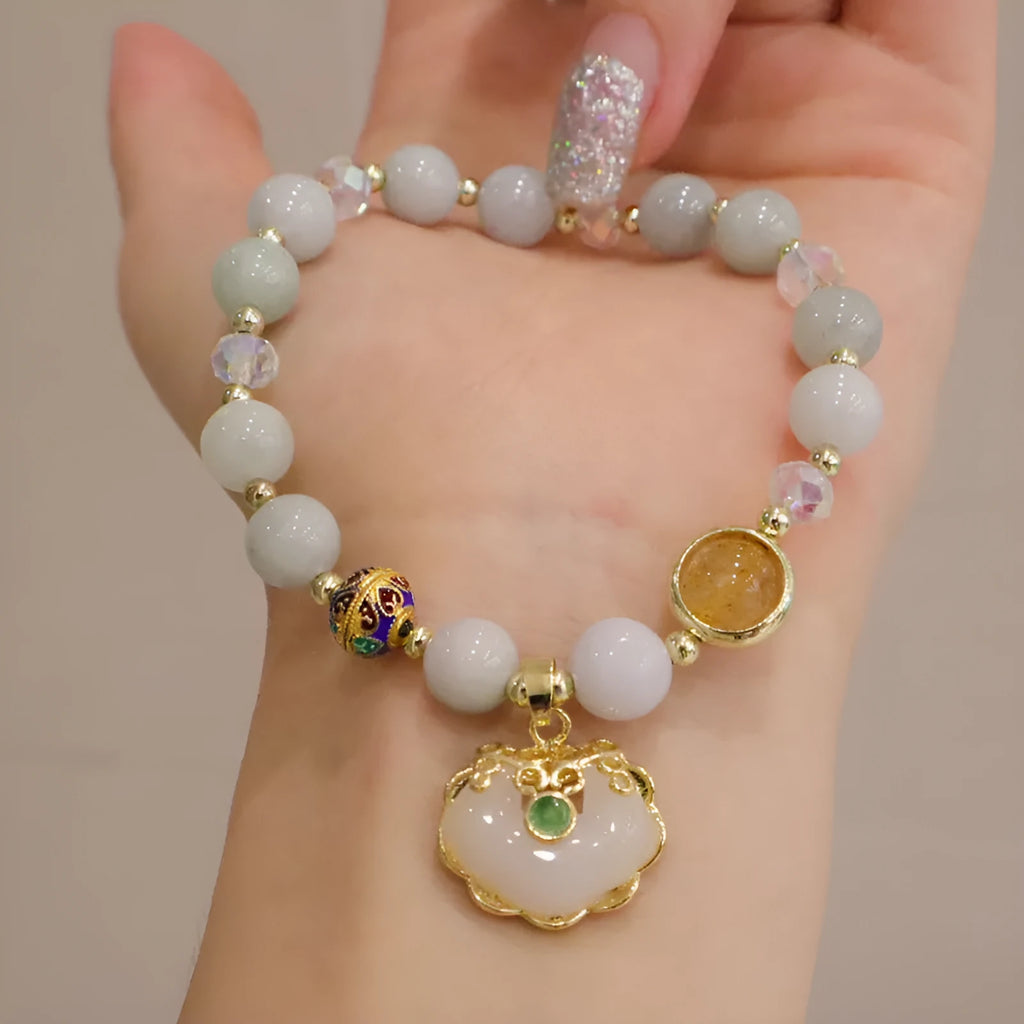Geometric women's bracelet with grey jade and strawberry quartz stones and metal accents