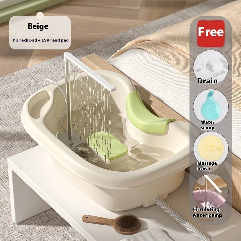 Beige and light pink plastic shampoo basin set for bed use with pump, pillow, and brush.