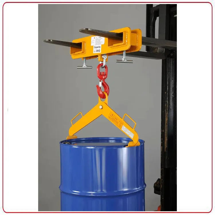 Iron forklift crane hook with rotatable head and safety lock mounted on forklift forks.