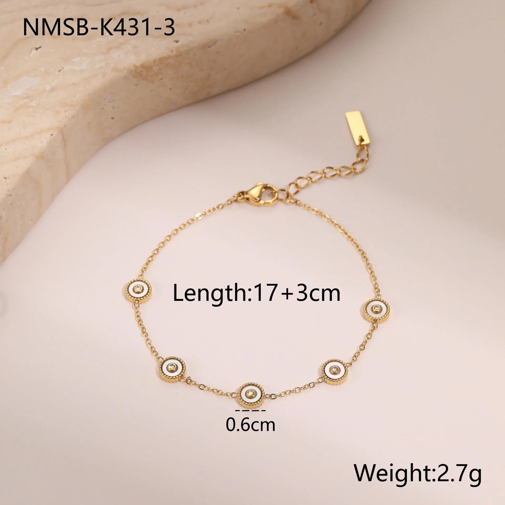 Stainless steel bracelet with 18K gold electroplating and geometric fritillary design, shown with matching necklace