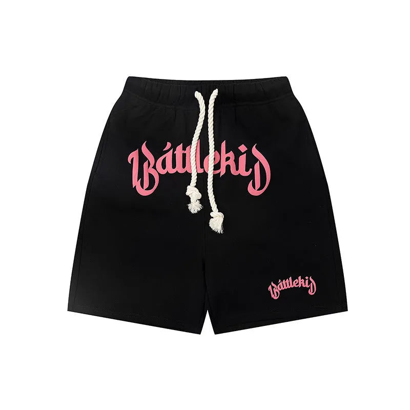 Men's loose-fit cropped sweatpants in cotton blend fabric, shown in black colour.