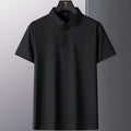 Man wearing a solid colour short sleeve non-iron business casual shirt in a professional setting.