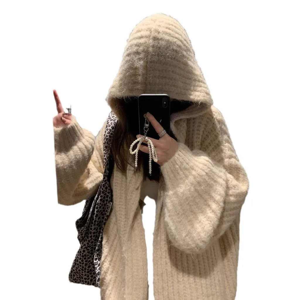 A loose-fit, thick acrylic hooded cardigan sweater for women, shown in a macaron colour.