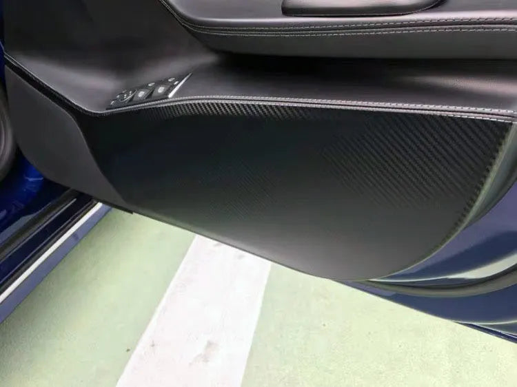 Carbon fiber anti scratch protective film applied to Model S front and rear door internal control panels