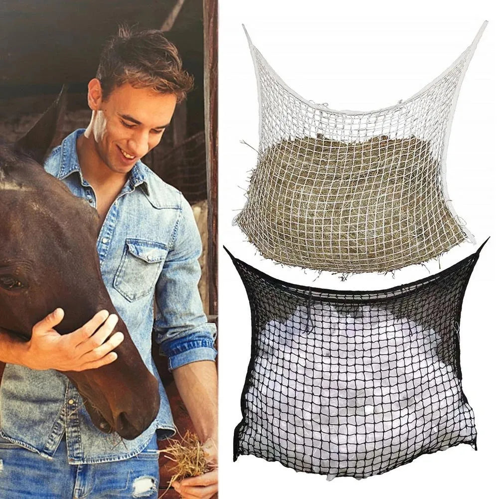 Woven grid horse feeding bag hanging with hay, shown in black colour