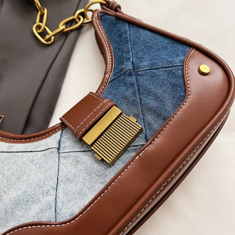 Brown soft denim women's bucket shoulder bag with diamond mesh and chain strap.