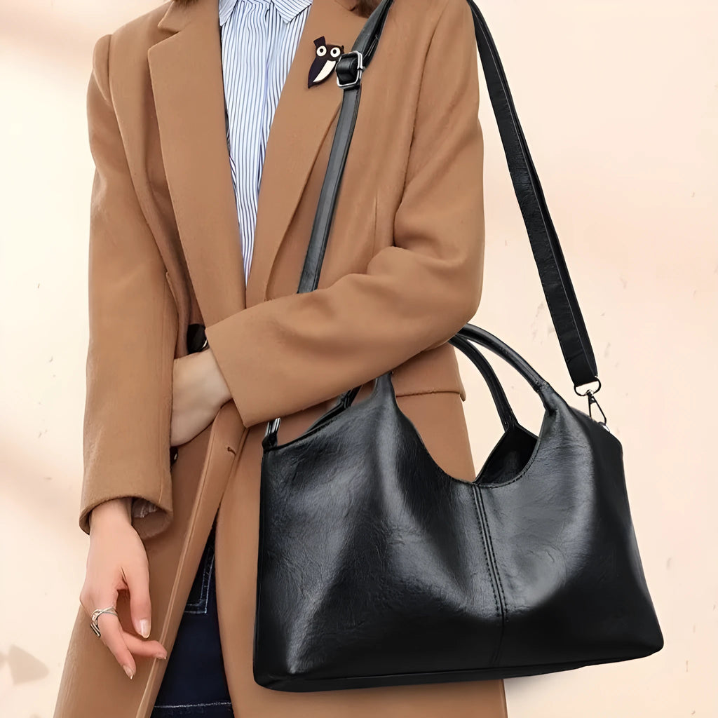 Genuine leather women's cross-body bag in seven colour options with large capacity interior