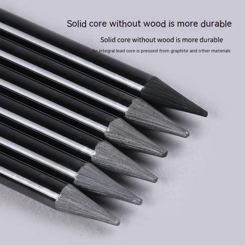Carbonised and graphite drawing pencil set of nine in a wooden case, showing six graphite and three carbonised pencils.