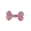 Dog bone pet barrette in size S with diamond accent, shown in white, pink, blue, and red colour options