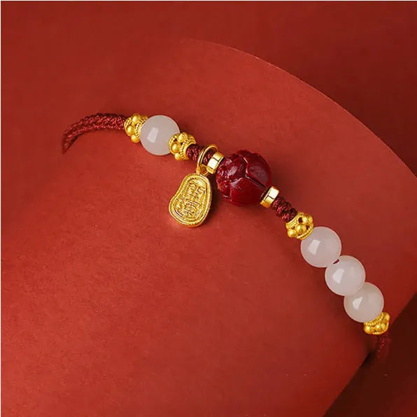 Women's adjustable bracelet with Hetian jade, cinnabar red rope and 925 silver components