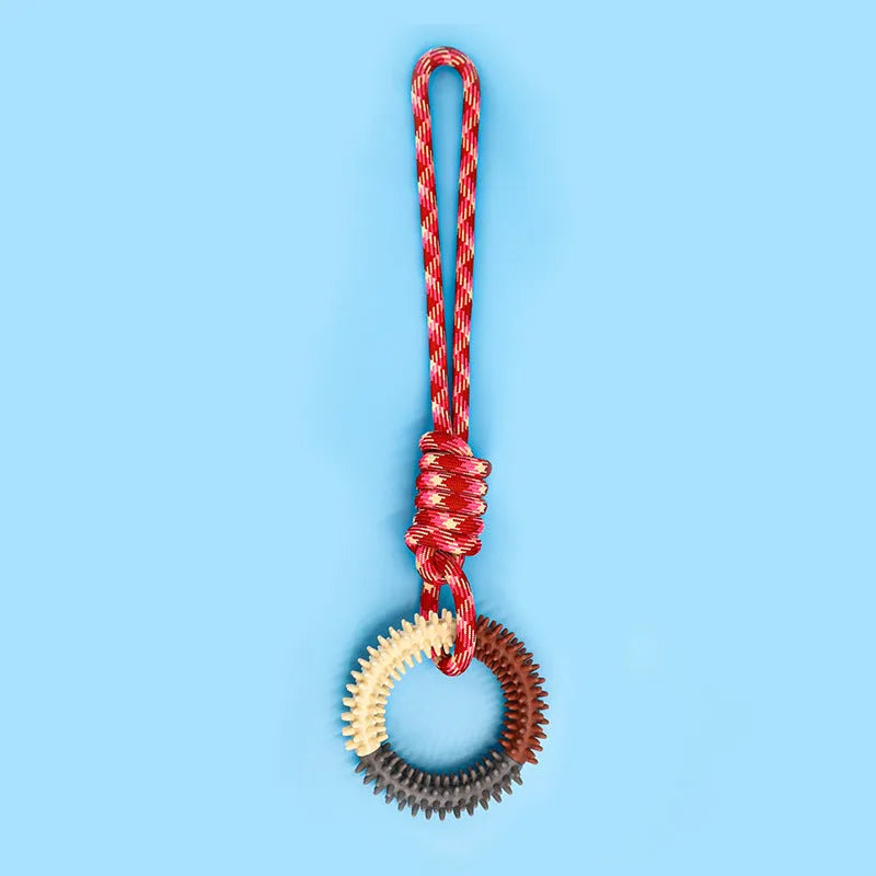 Blue braided rope dog toy with a central knot, shown next to a red and rose red version.