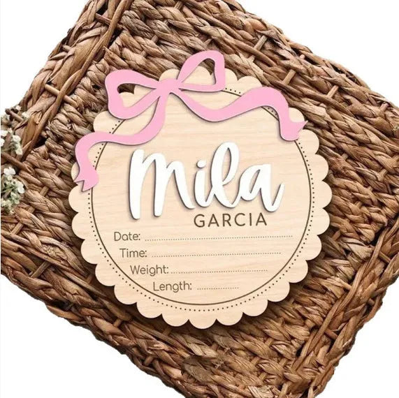Square wooden baby room decoration ornament with a personalised name engraved in the centre.