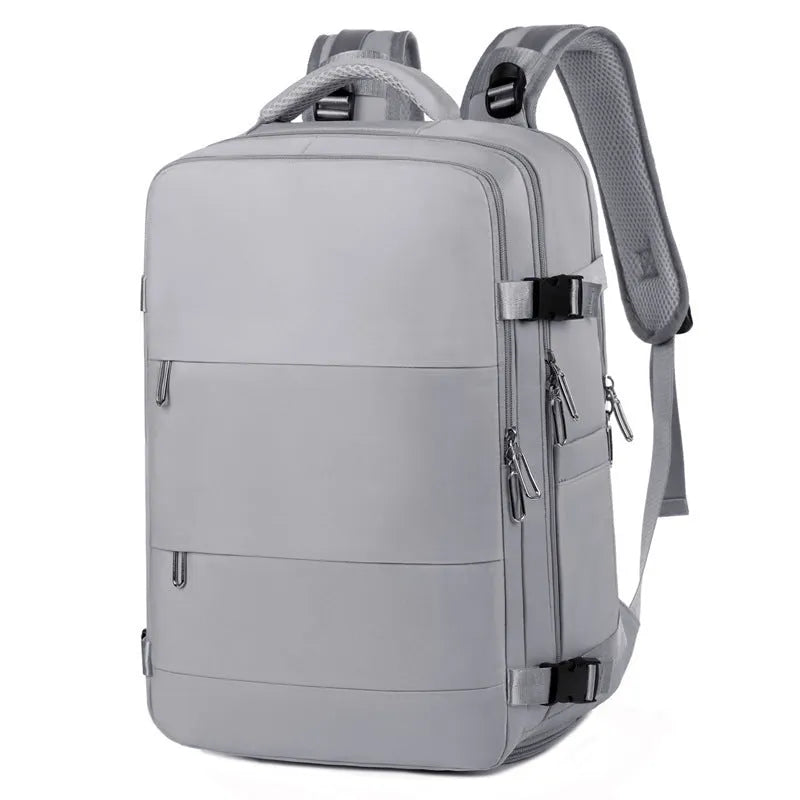Purple waterproof travel backpack with multiple compartments showing 36-55L capacity