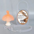 Small pink mushroom-shaped silicone gel fidget gum inside a transparent box