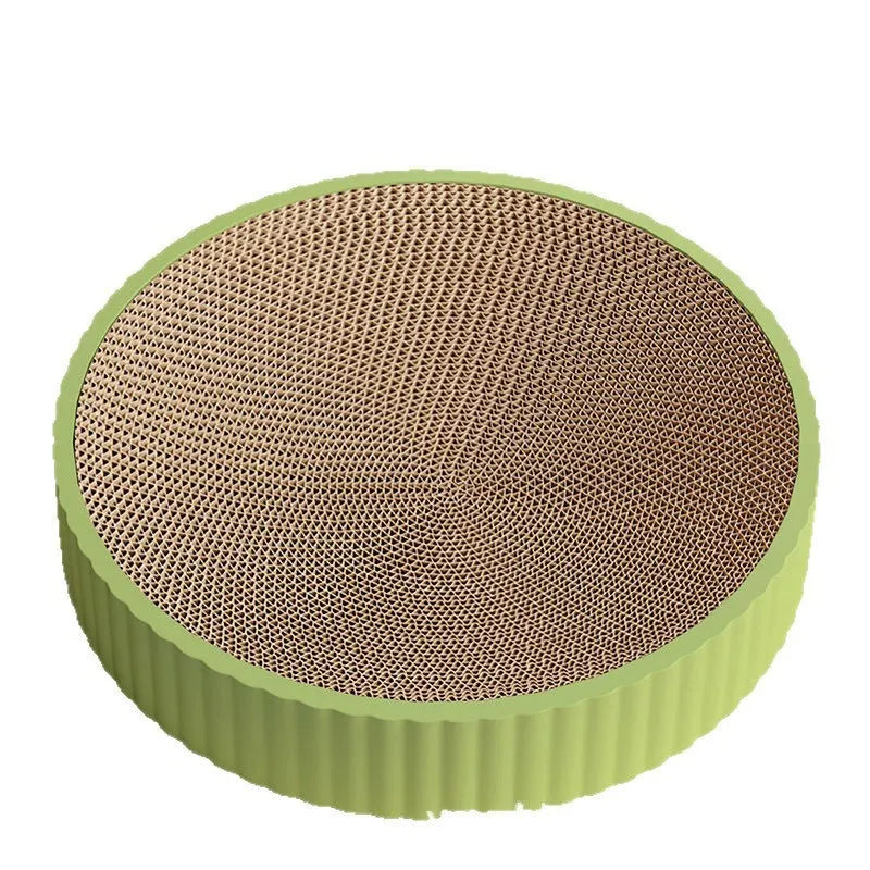 Round green cat scratching board and nest with replaceable corrugated cardboard surface, 55 cm diameter.