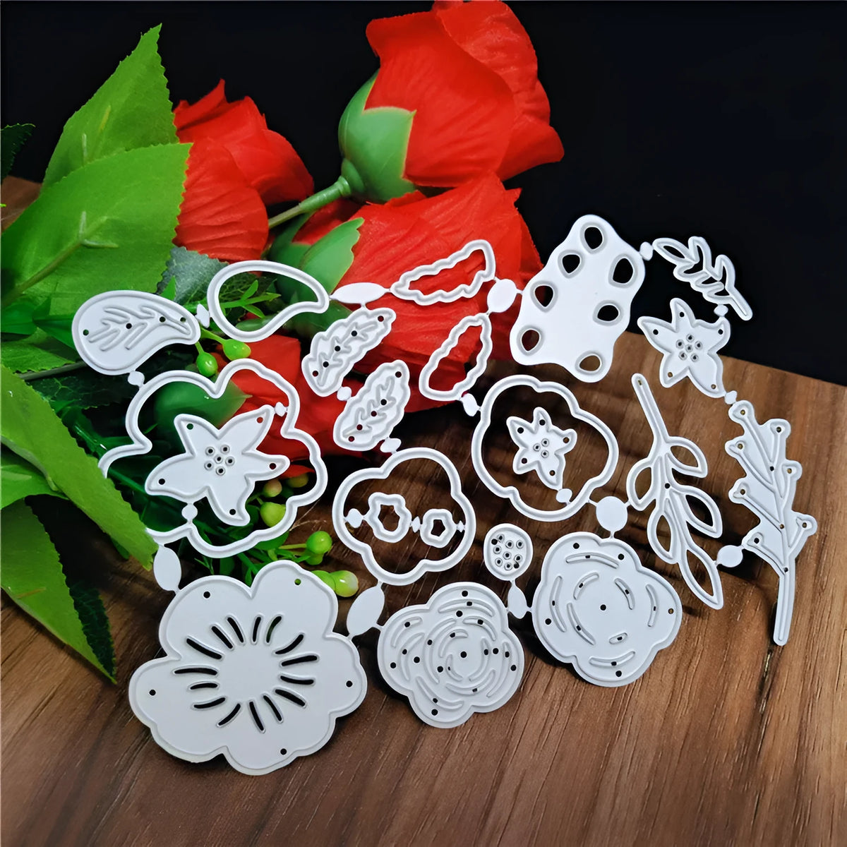 Silver carbon steel flower cutting die for paper crafts measuring 14.3 by 9.9 centimetres