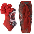 Women's one-piece swimsuit set with gauze skirt in a blue printed pattern.