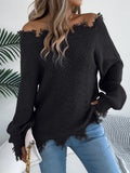White hollow-out off-the-shoulder long-sleeve pullover sweater laid flat.
