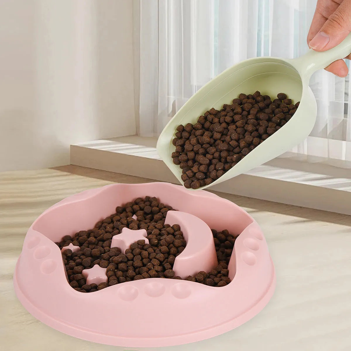 Moon star wings design slow feeder pet bowl in assorted colours on a non-slip base.