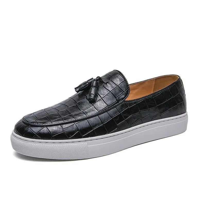 Men's plus size black business casual sneakers with a tassel detail on the PU upper and a rubber sole.