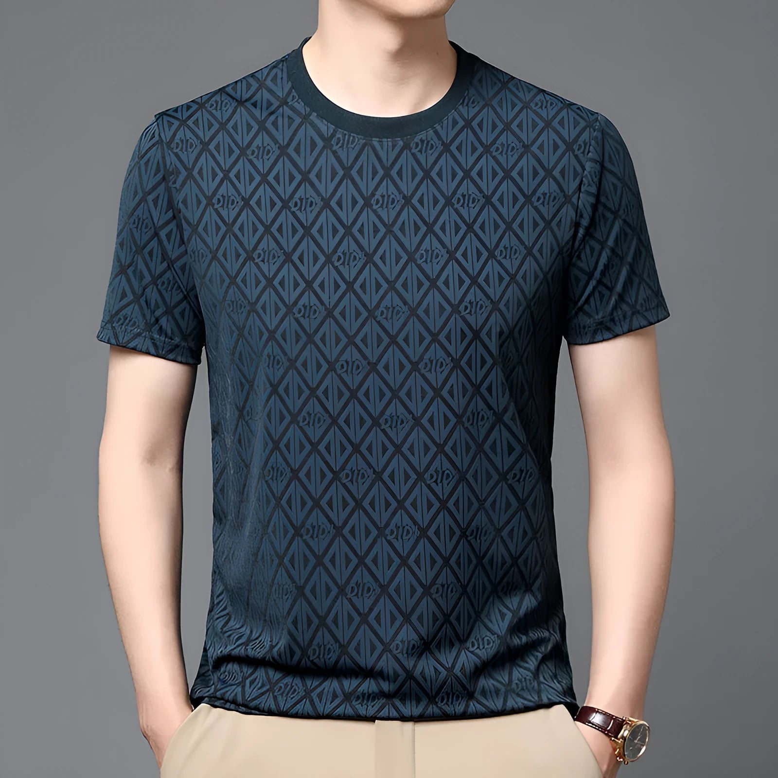 Man wearing a loose fit round neck short sleeve shirt in ice silk fabric.