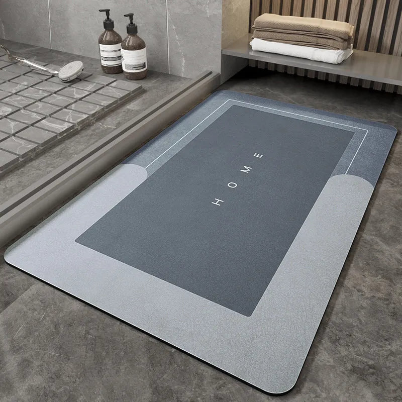 Cushioned blended fabric bathroom floor mat in blue colour, oval shape on a tiled floor.