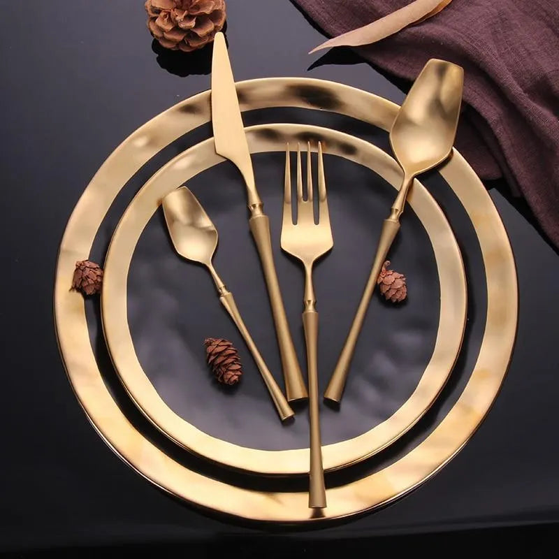 Four-piece stainless steel cutlery set with main knife, main fork, main spoon and teaspoon for gift-giving occasions