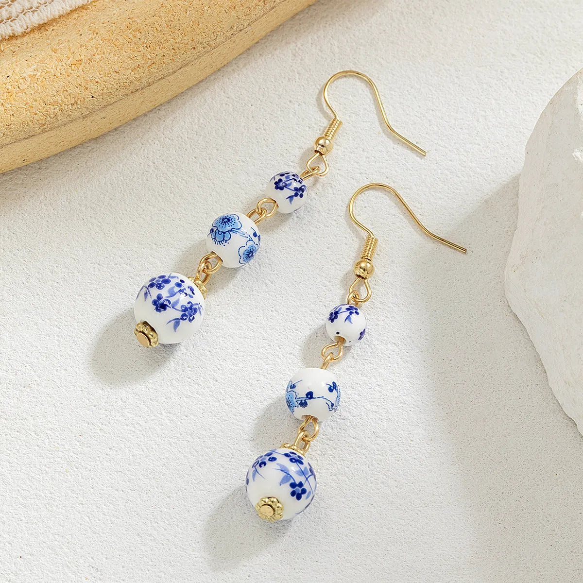 Blue and white porcelain ceramic bead geometric retro earrings with alloy electroplated finish