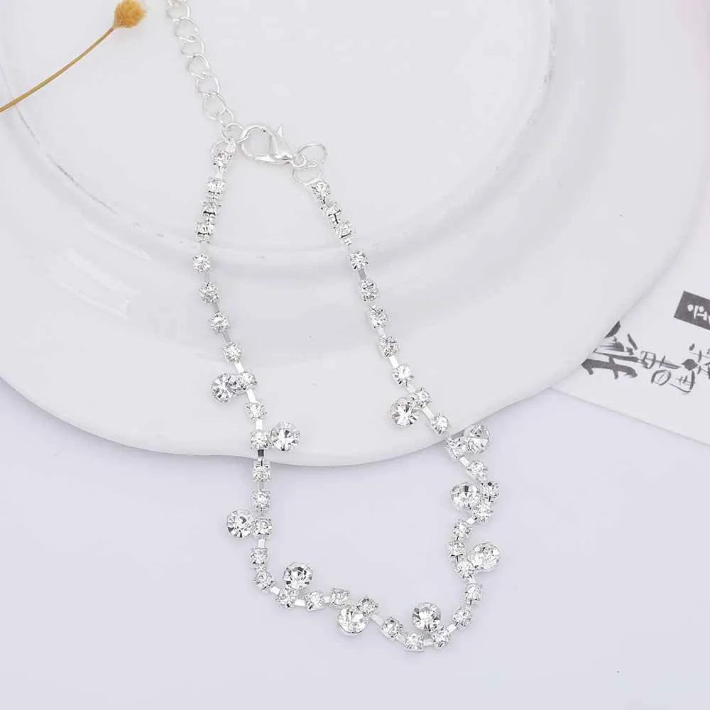 Silver tone water drop anklet with tassel and inlaid stone detail, 24+5 cm women's anklet