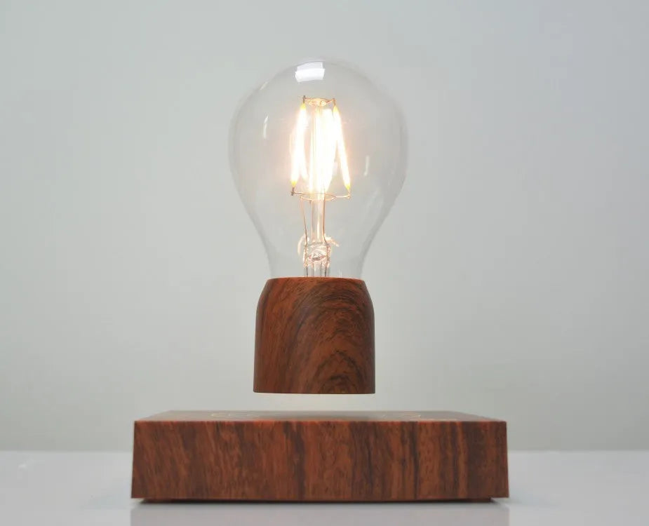 Magnetic levitation floating light bulb on an imitation wood base with multiple international plug options