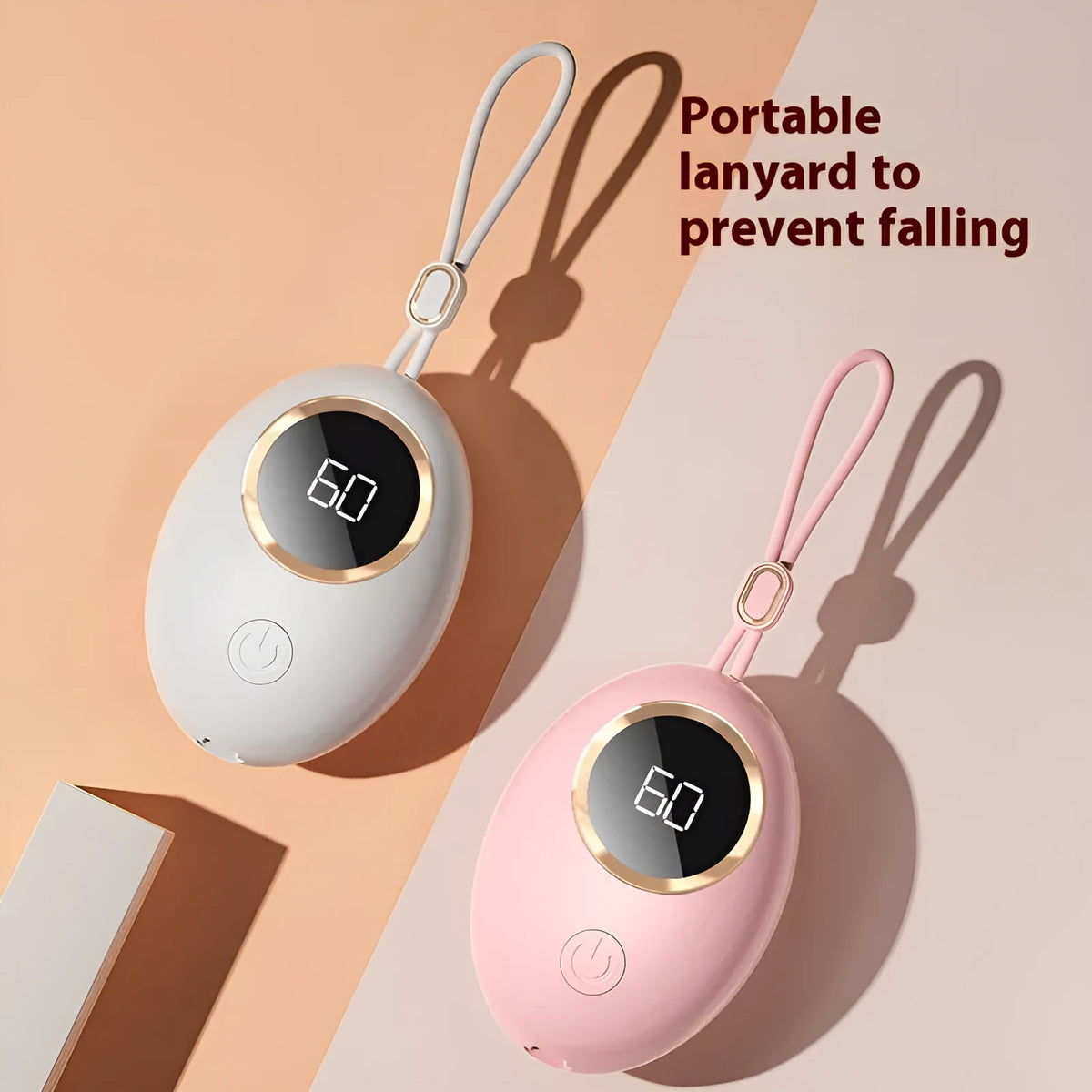 Compact USB rechargeable hand warmer power bank with digital display, shown in pink colour.