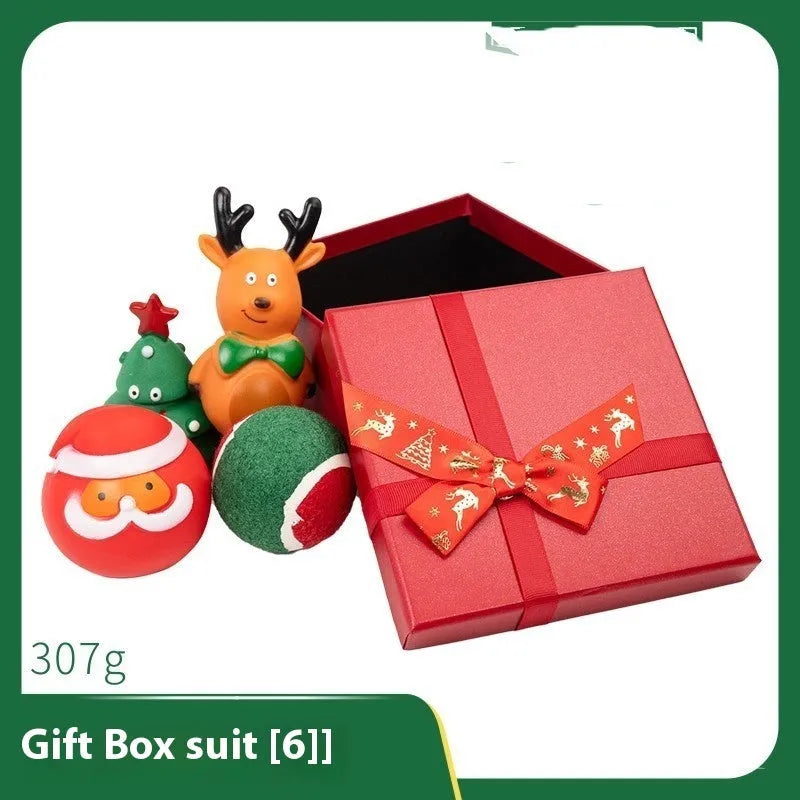 Seven sets of colourful vinyl Christmas dog toys including barbells, balls, bite ropes, and Santa Claus figures