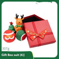 Seven sets of colourful vinyl Christmas dog toys including barbells, balls, bite ropes, and Santa Claus figures