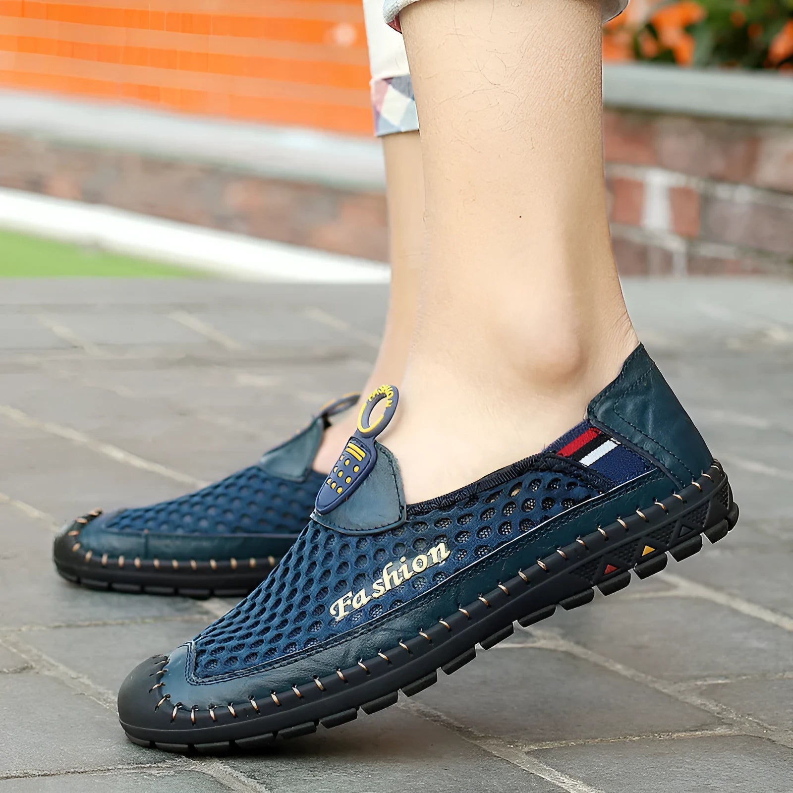 Men's brown casual breathable mesh shoes with round toe and rubber sole.