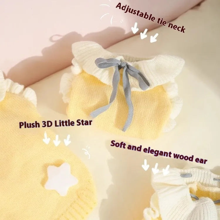 Yellow acrylic dog sweater with Fairy Dress pattern on a small breed dog.