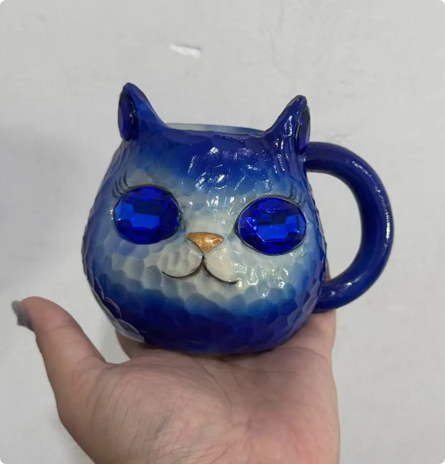 Resin cat cup decorative figurine ornament in purple, green, blue, or pink colour.