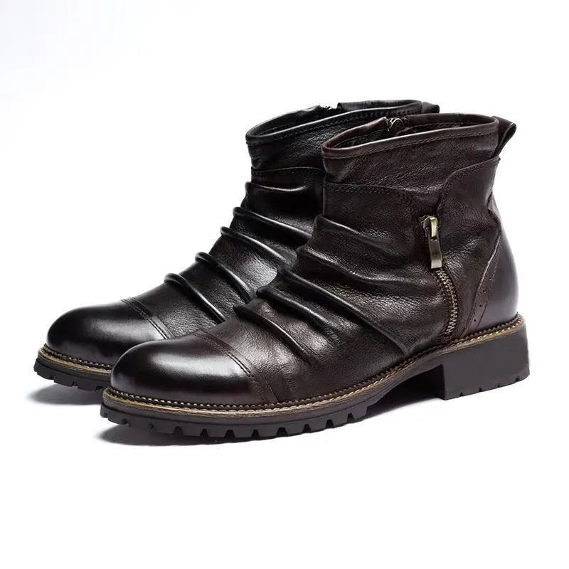 Black mid-height cowboy boots with side zipper, round toe, and a low horseshoe heel on a white background.