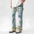Yellow and blue retro patchwork splash-ink damaged design jeans with mid waist and zip fly