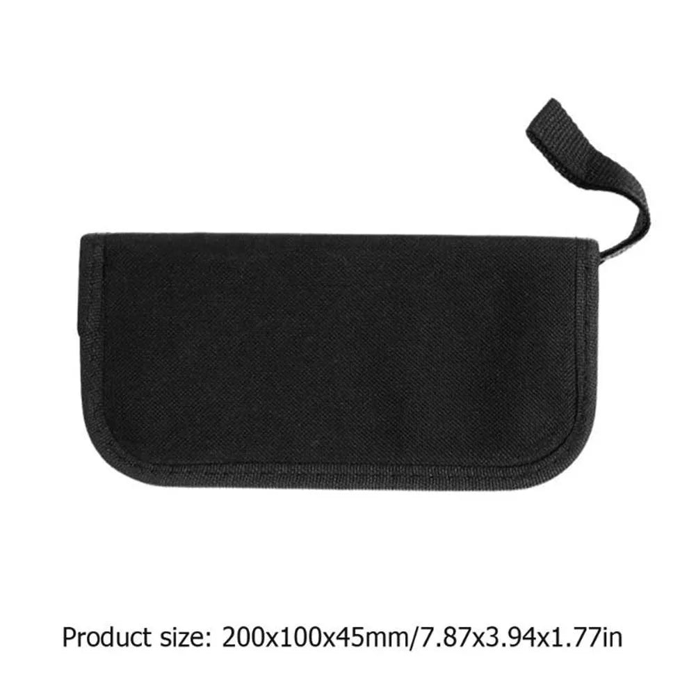 Black compact case open to reveal a guitar repair and maintenance tool kit for guitars, basses, mandolins, and banjos.