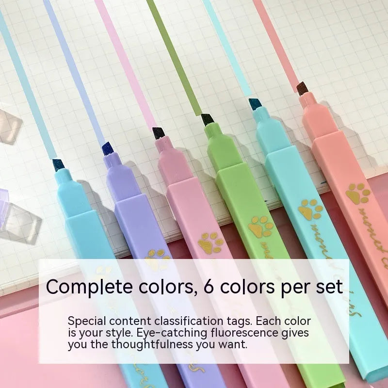 Box containing six Cat's Paw fluorescent marking pens with oblique nibs in assorted colours.