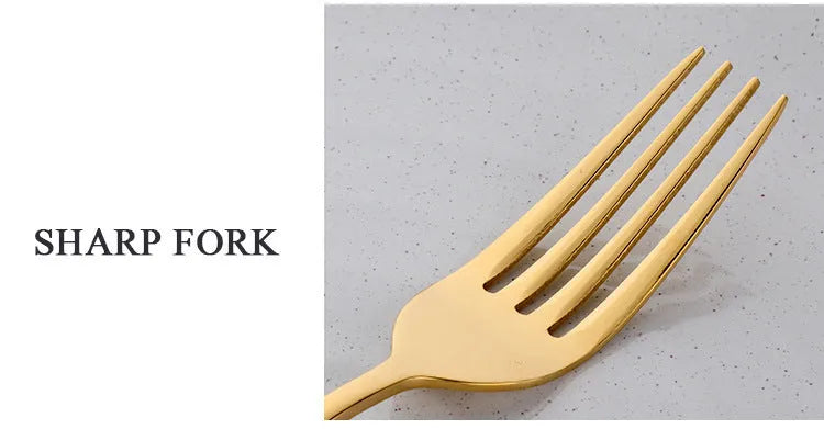 Black stainless steel four-piece cutlery set with mirror-polished finish on a plain surface
