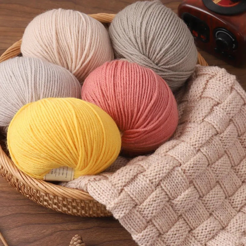 Hand knitting wool yarn in multiple colours for baby scarf and sweater projects