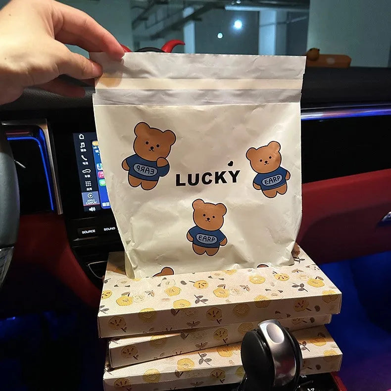 PE car trash adhesive clean bag with flat top design, available in Lucky Bear and Rabbit styles, 20 or 40 pieces.