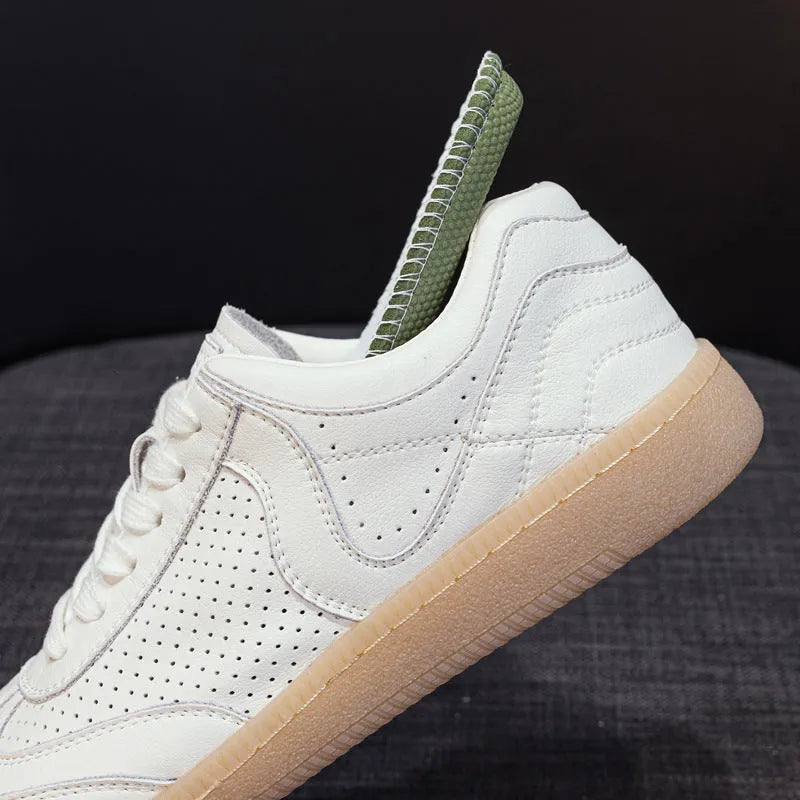 Breathable hollow casual shoes in white with cowhide upper, flat heel, and round toe