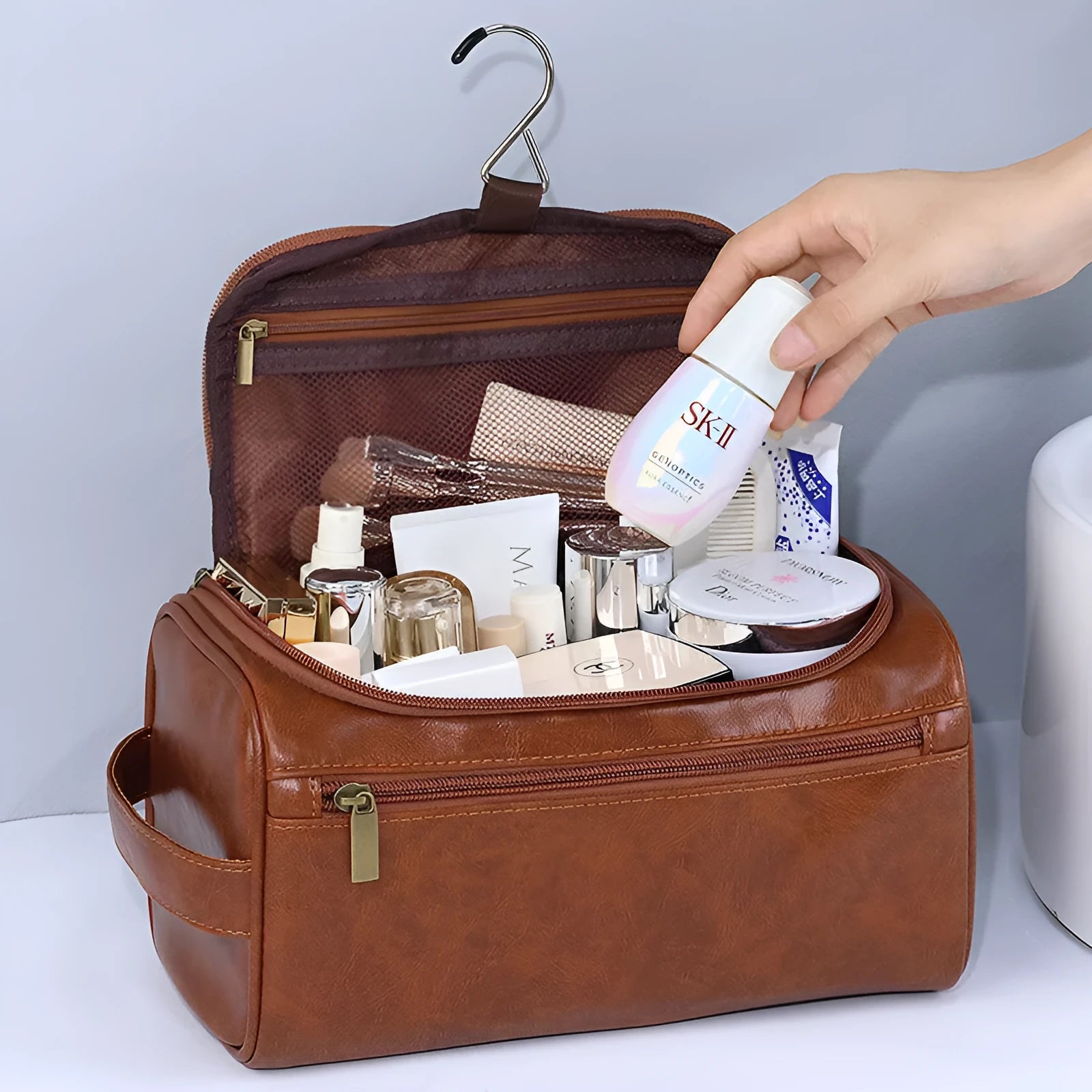 Large capacity waterproof makeup bag in Pu leather available in six colour options including black, navy, beige and brown