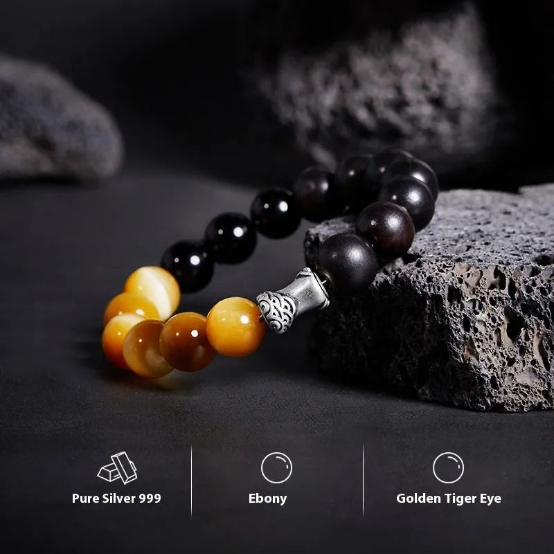 Men's handmade obsidian bracelet with sterling silver accents, Mountain and Sea Fearless design